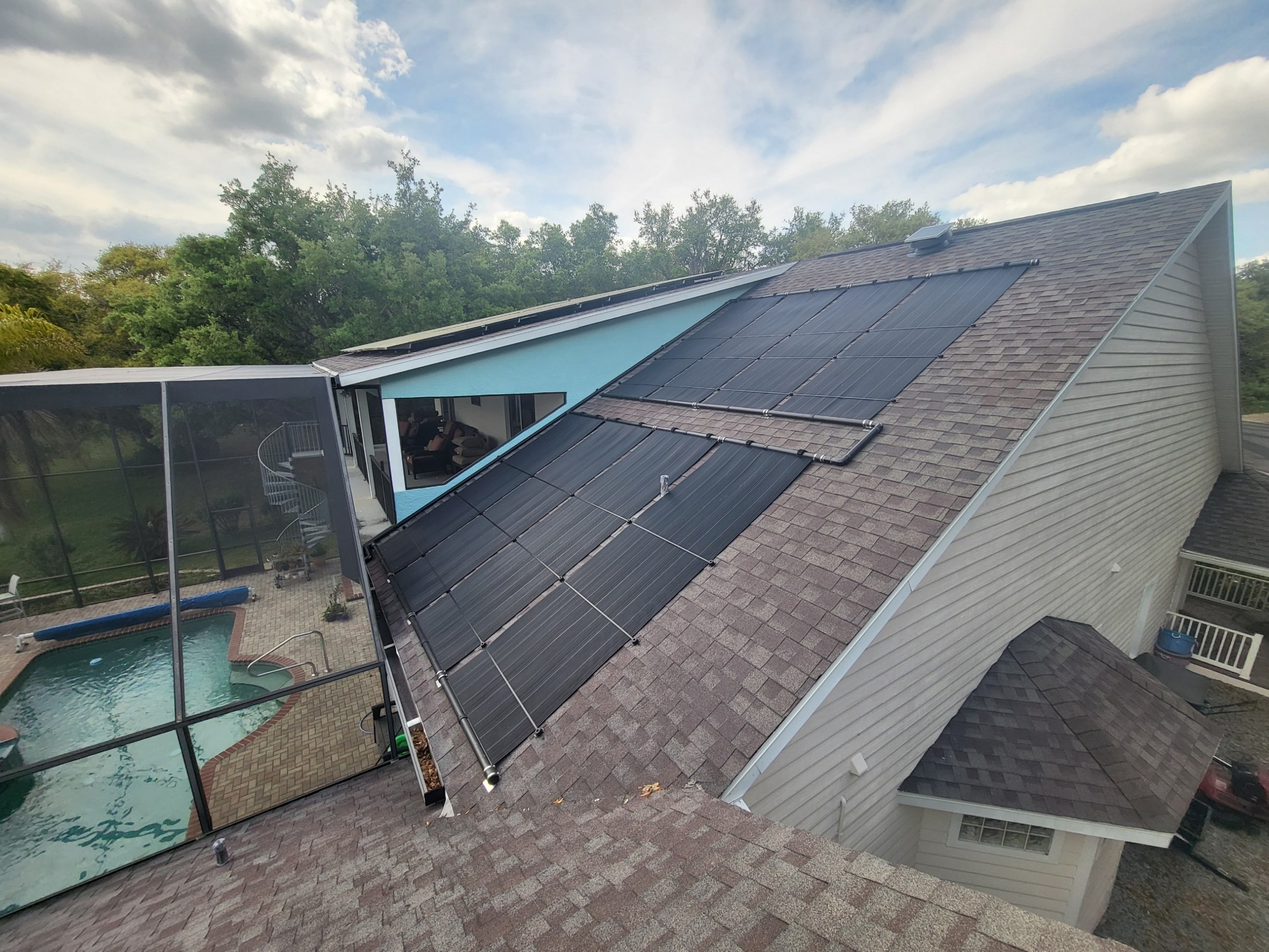 Solar Pool system and attic fan small box up top of roof